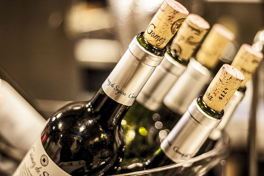white-labeled-bottles-with-corks-bottles-of-wine