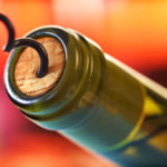 Cork screw and wine bottle