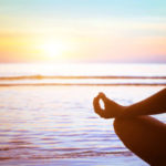 53113991 – meditation concept, yoga practice on the beach at sunset