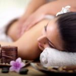 Beautiful woman having a wellness back massage