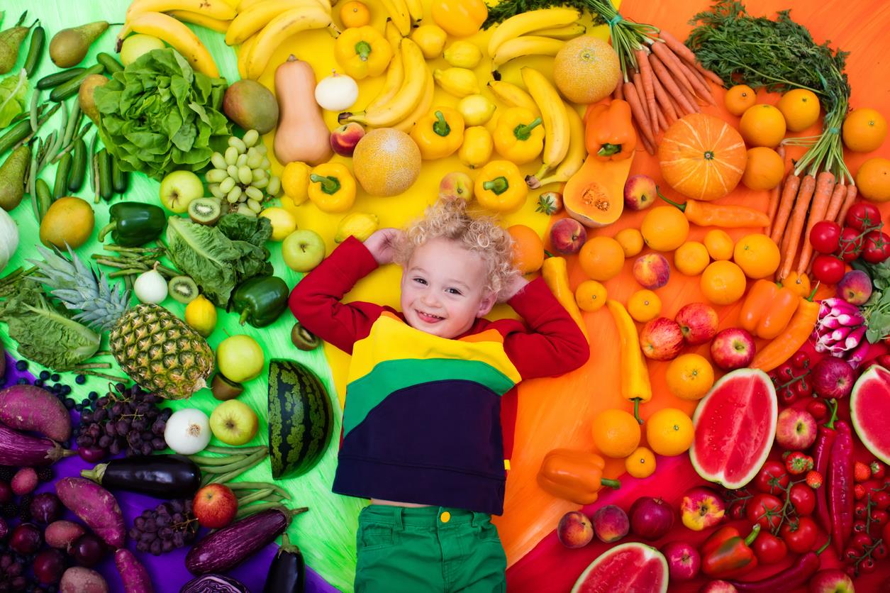 boy enjoying the rainbow-
