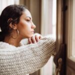 pensive-woman-in-front-of-the-window-1129696669-6587dc0aed684d58927787b49a85cf47